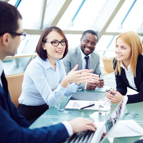 Professionals collaborating around a table